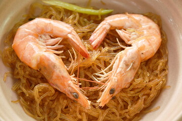 shrimp steamed with glass noodles on bowl
