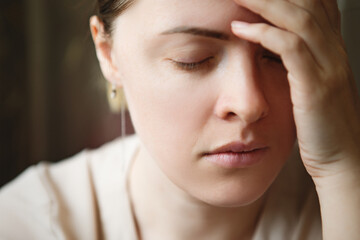 Sad unhappy woman crying home