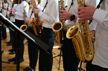 orchestra playing saxophones close-up