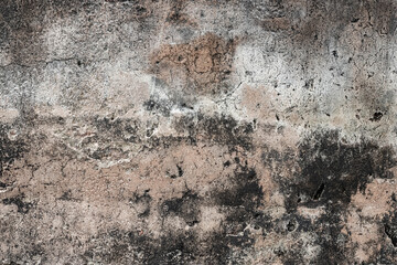 Rough textured old cement wall with stains and scratches