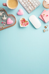 Top view vertical photo of keyboard computer mouse heart shaped stationery holders pins clips sticky note paper candles glasses and cup of coffee on isolated pastel blue background with empty space