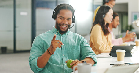 Call center, customer service and a business black man writing in a notebook while working on a...