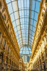 Gallery Vittorio Emanuele ll in a Sunny Day in Milan, Lombrady, Italy.
