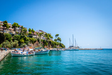 Yachts moored up in the port of the Greek island of Alonissos, Sporades, Greece