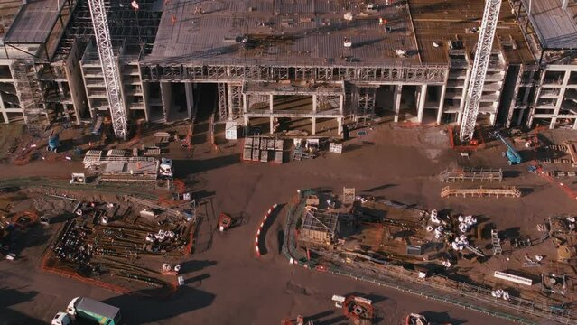 Slow pan up of construction work at new stadium for Everton Football Club