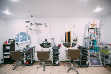 Fototapeta na wymiar Modern interior of a hairdressing salon. Nobody.
