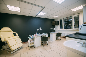 The interior of the nail salon without people. A bright, modern salon for the care of nails