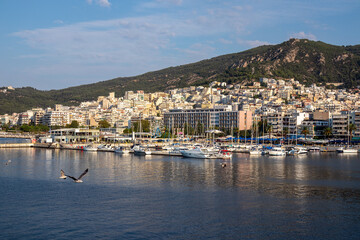 Fototapeta na wymiar Kavala Marina with the City and hills behinds it, Northern Greece.