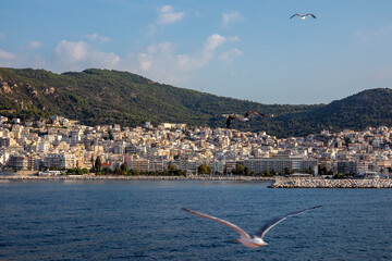 Approaching Kavala, Northern Greece, from the Sea with seagulls hovering