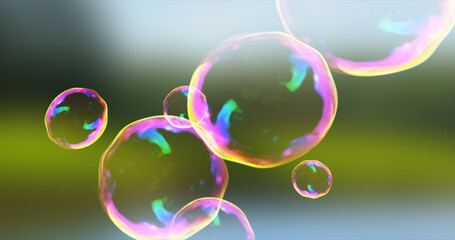 Abstract transparent soap bubbles flying up bright iridescent beautiful festive on the background of nature. Abstract background