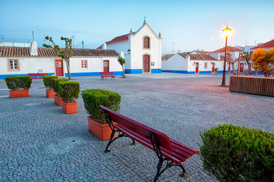 Sunset in the Portuguese town of Porto Covo. Their houses are painted white and decorated with numerous flowers. Sines