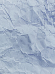 Abstract wrinkled or Free photo crumpled blue paperboard or empty canvas or paper surface with folded stains.	
