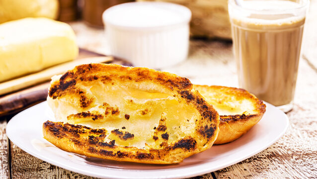 Brazilian breakfast snack called bread in the "chapa". French bread, cut in half and baked with butter, Brazillian tipical food