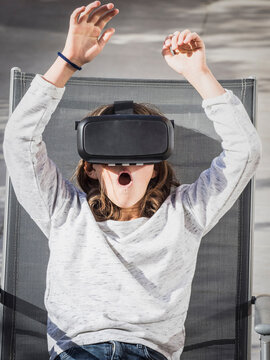 Girl wearing virtual reality glasses