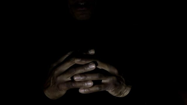 man praying to god with hands together on black background stock video stock footage