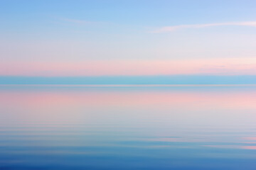 Naklejka na ściany i meble Scenic View of Sea Against Sky in Blue With Pink Colors Before Sunset
