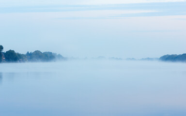 Dense Fog over the River in the Morning - 565058356