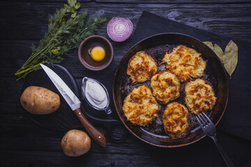 Homemade Traditional potato fritters on a Background