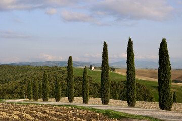 Chapel Vitaleta. Tiny, secluded chapel framed by cypress trees with striking views of the surrounding countryside. San Quirico d'Orcia, Province of Siena, Italy.