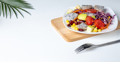 
 cooking vegetable salad ,vegetable salad top view mix fruit and  on white dish, Green vegan salad from green, 
Healthy clean eating layout vegetarian food, Fresh salad for breakfast