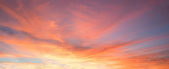 Fototapeten colorful sunset sky panorama with pink orange and yellow clouds © SusaZoom