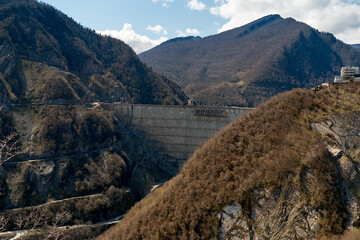 The dam of the Inguri hydroelectric power plant in the Sakartvelo mountains. A natural mountain...