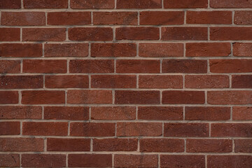 Fototapeta premium Background of old vintage dirty brick wall with peeling plaster, texture, Background of brick wall texture