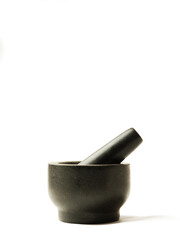 mortar with pestle over h backdrop, marble black color ,stone color , shadow, hight definition, clean image, cock and medicine utensil, tool pestle