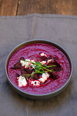 Beetroot soup with goat cheese and beetroot crisps