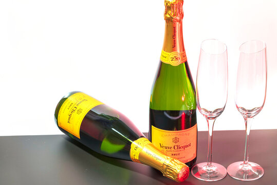 Close-up view of two champagne bottle and two glasses on background isolated. Sweden. 