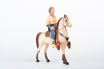 Fototapeta na wymiar Cowgirl Toy with Horse