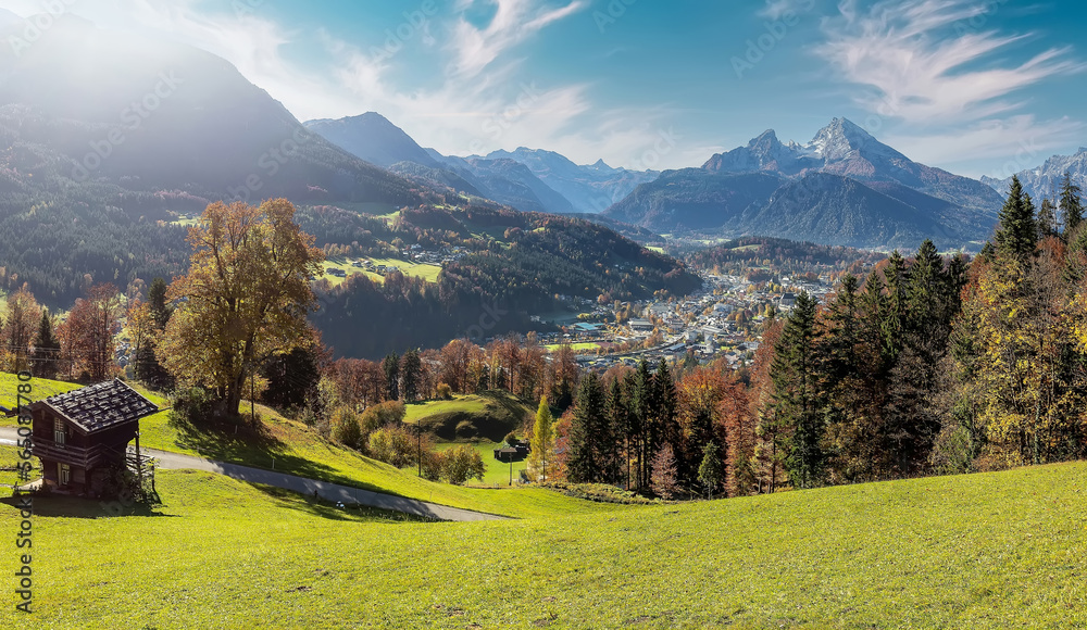 Fototapete Beautiful nature landscape. Incredible autumn scenery. View on Alpine highlands with Watzmann mount, colorful trees and Small hut. famous tourist attraction. Berchtesgaden. Bavaria Alps. Germany