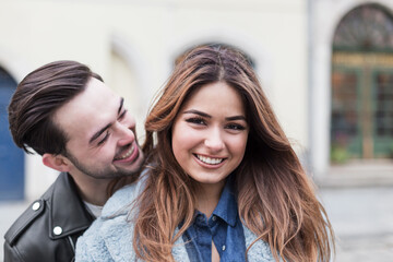 stylish happy couple enjoying a date on the street of a European city