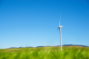 Fototapeta premium Wind turbine for electric power production in a prairie.
