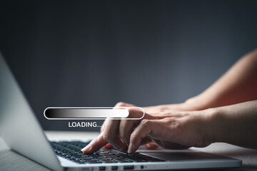 Man using laptop for download software and waiting to loading digital business data form website, concept of waiting for load of loading bar.