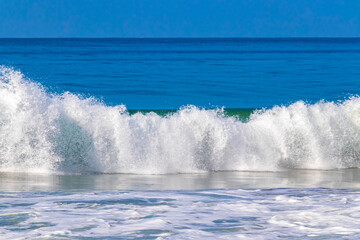 Fototapeta premium Extremely huge big surfer waves at beach Puerto Escondido Mexico.