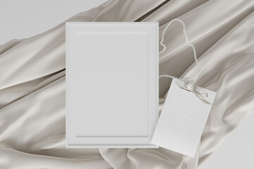 Feminine wedding mockup with blank greeting card and empty frame. Satin material on white background. Empty place.3d rendering