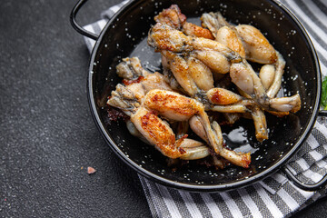 fried frog legs second course meat french food healthy meal food snack on the table copy space food background rustic top view