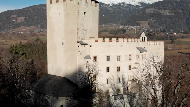 Lienz Castle aerial view in winter, Austria