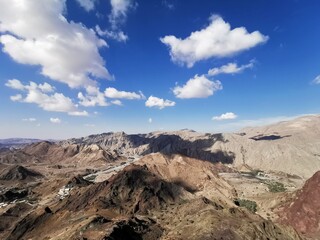 Fototapeta na wymiar A view of Hajar Mountains in Ras Al Khaima Emirate in the United Arab Emirates