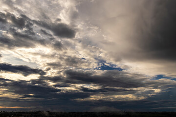 Dramatic sunset in the Sky through cumulus storm clouds, Timelapse. Awesome epic landscape. Amazing vibrant colors, in Brazil