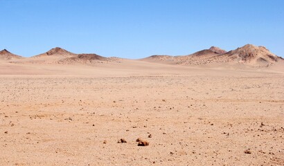Fototapeta premium Desert landscape, desertification and water shortage in Namibia due to climate change and global warming in Africa