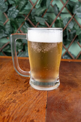 glass of beer on table