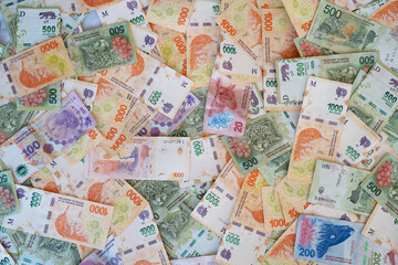 Currency notes of Argentine peso cash.Economic,financial crisis in Argentina, economy, money, bank concept, background.