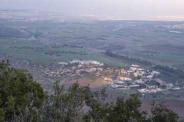 Northbound aerial view of Jezreel Valley [Valley of Megido], as seen from Mount Tabor in Lower Galilee, in the Northern district of Israel, Israel