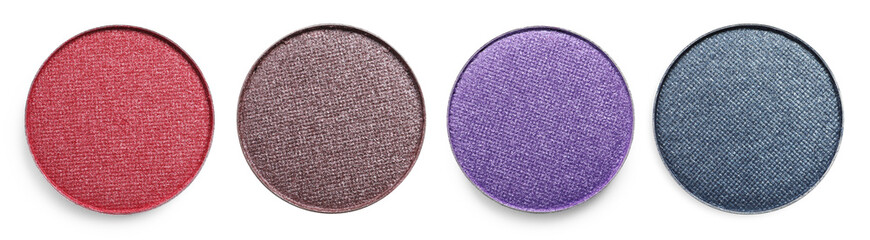 Set of beautiful different eye shadow refill pans on white background