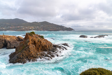 The rocky, scenic coastline along the Pacific Ocean at the cape of Punta Banda, southwest of the...