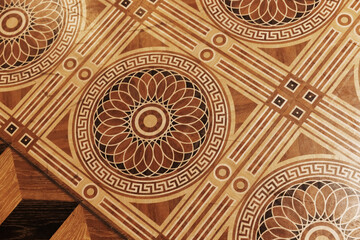 Classic flooring pattern of vintage wooden parquet. Background photo