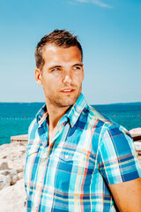 Fototapeta premium Man standing on the beach