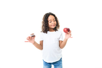 Child girl with Cupcake and apple on white background